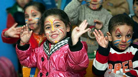 children with painted faces